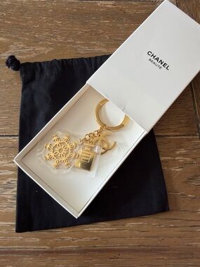 CHANEL Gold Logo & Charm Keyring with Snowflake and Perfume Bottle Charms